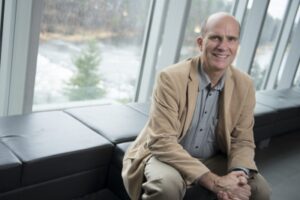 Prof. Richard Ernst sits next to a window.