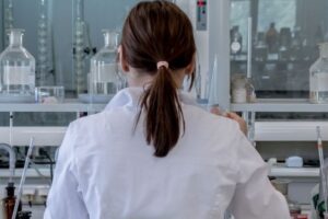 A student works in a lab space.
